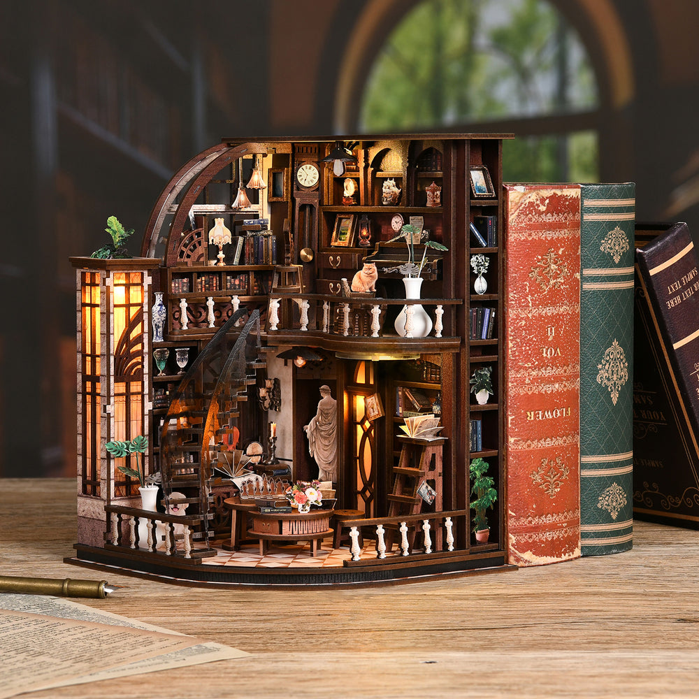 Miniature wooden bookstore dollhouse model with books and warm lit interior shelves