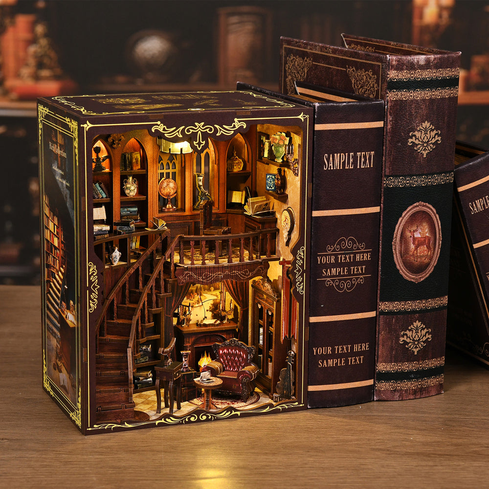 DIY miniatures book nook kit box beside instruction booklets with ornate covers