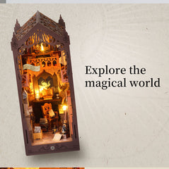 Open miniature book nook diorama with warm glowing lamp and ornate bookshelf details