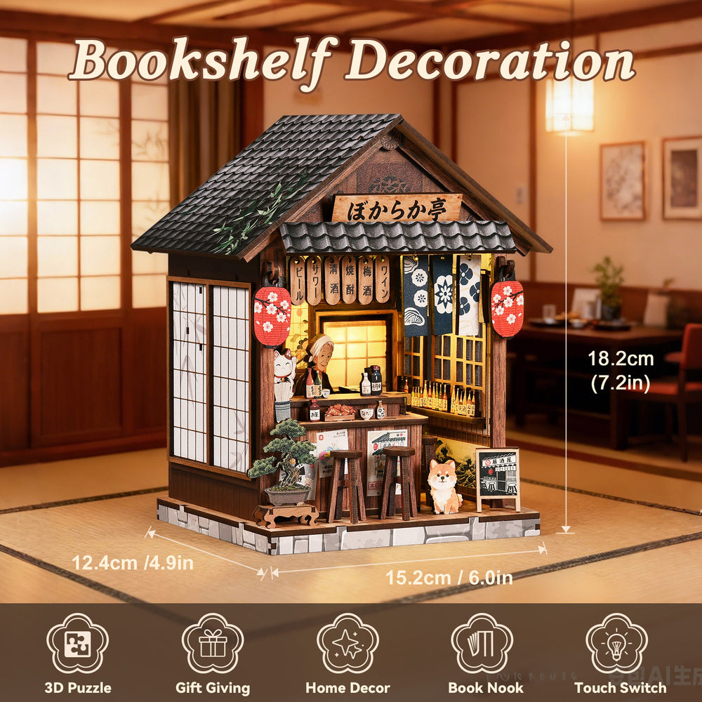 Miniature wooden pub book nook house with tiled roof, lit window, and front porch steps