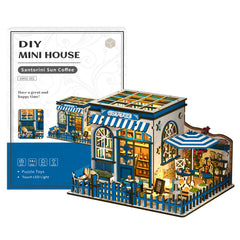 DIY mini house kit box with miniature coffee shop building, blue trim and striped awning