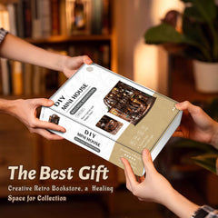 DIY mini house kit box held in hands, featuring a miniature bookstore scene