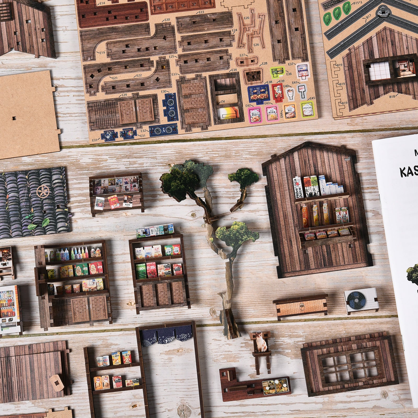 DIY miniature grocery store kit, top view of wall panels and small storefront props
