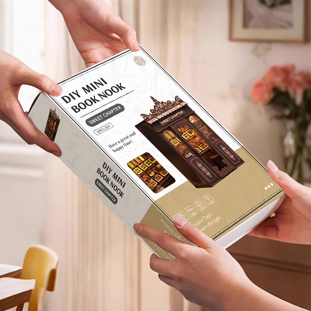 DIY mini shop kit box held by hands, showing front label and mini storefront photo