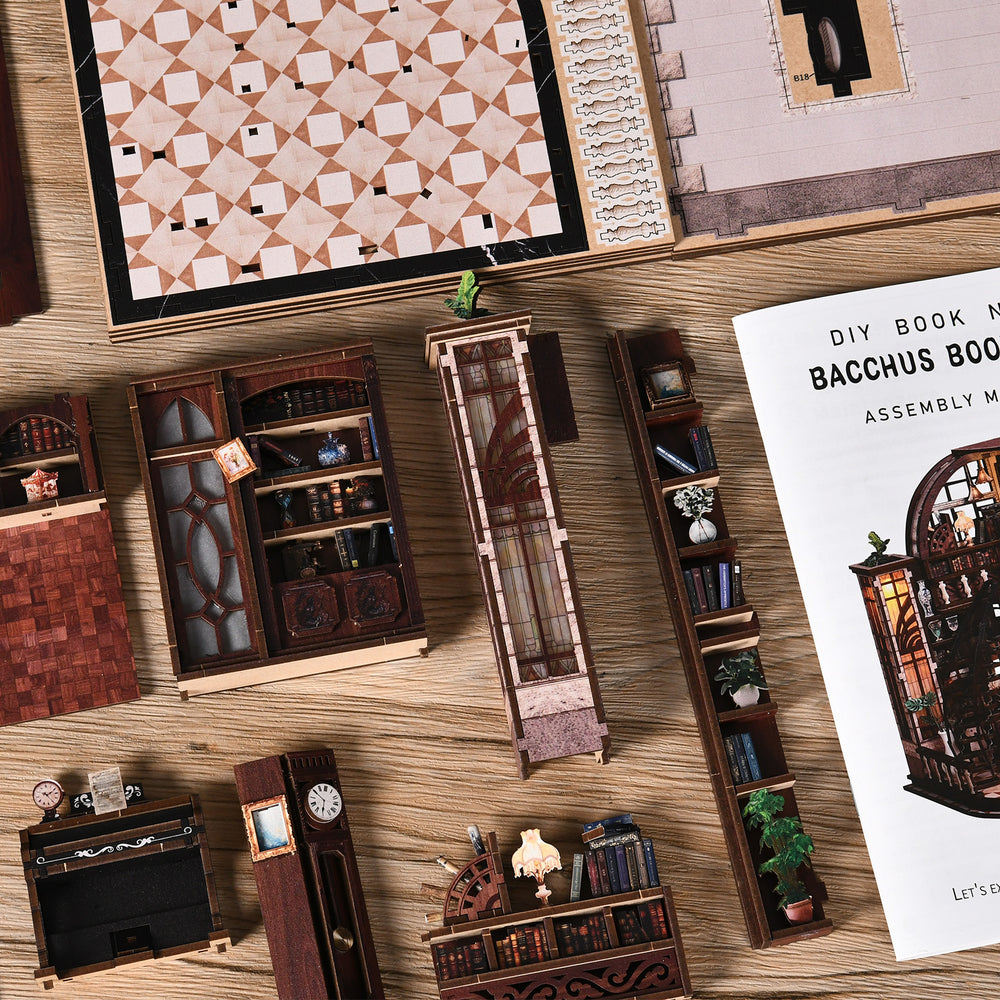 Miniature wooden bookstore kit parts and instruction sheet laid out on a tabletop