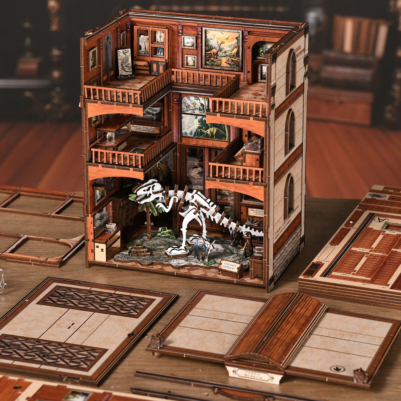 DIY miniature kit open-sided building with interior platforms and dinosaur skeleton figures