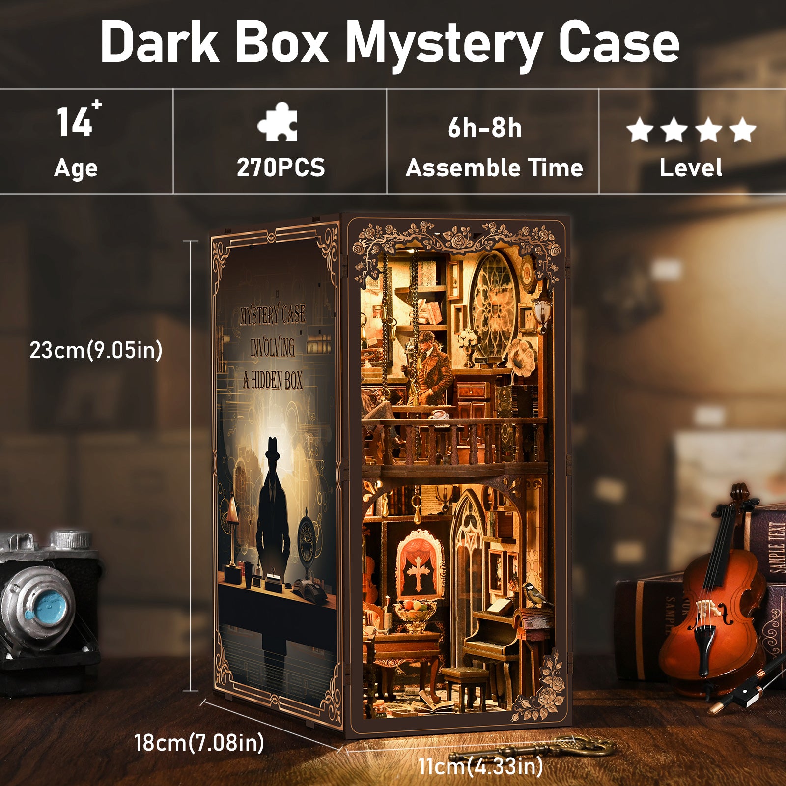 DIY book nook display case with lit miniature room inside an ornate dark box