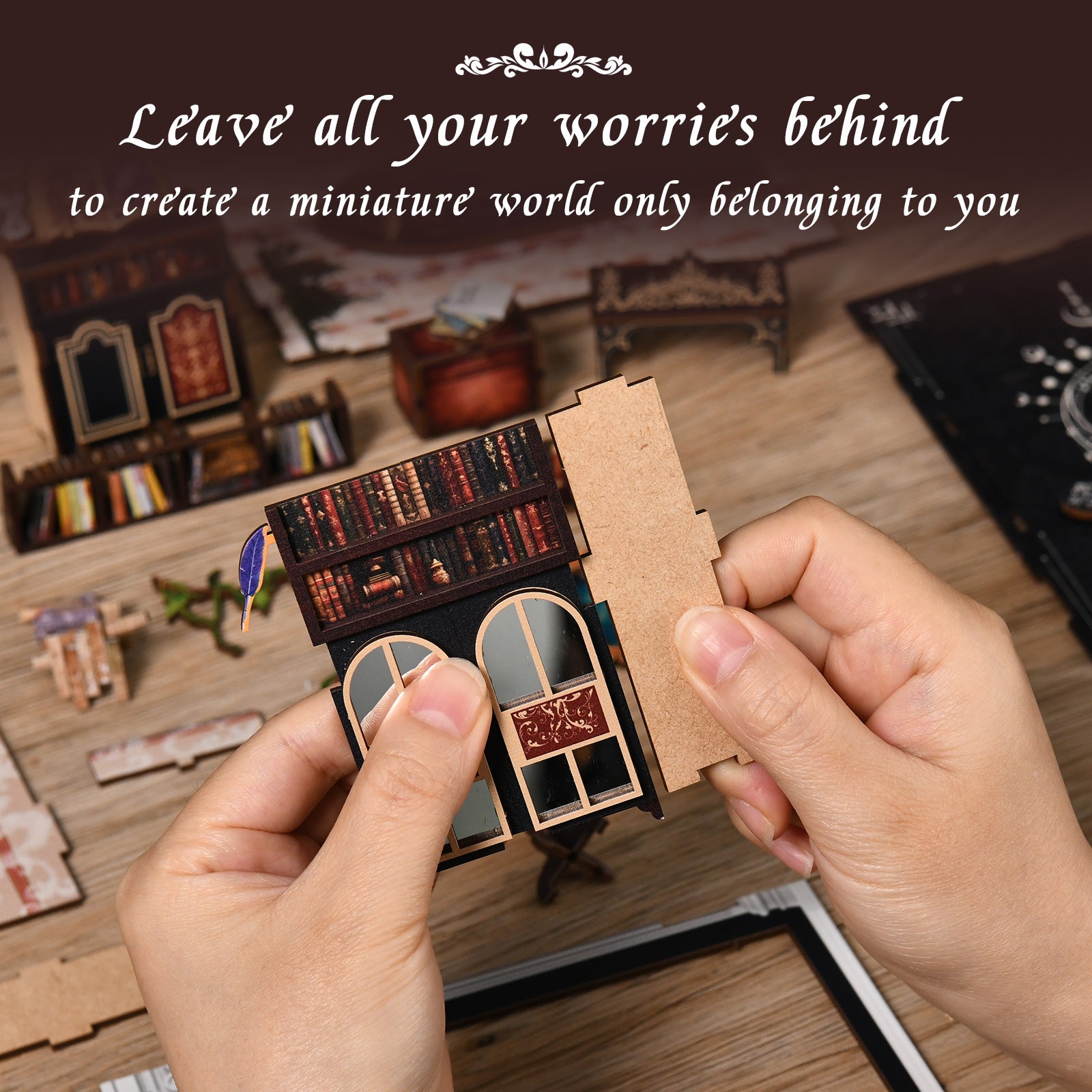 DIY miniature book nook kit pieces, hands assembling a small cabinet doorway