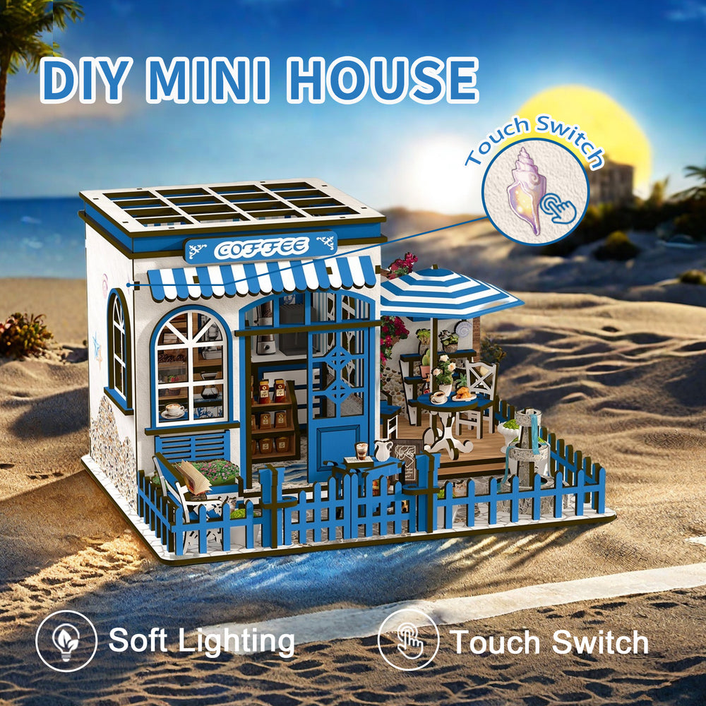 DIY miniature coffee shop house kit with blue windows, striped awning, courtyard seating