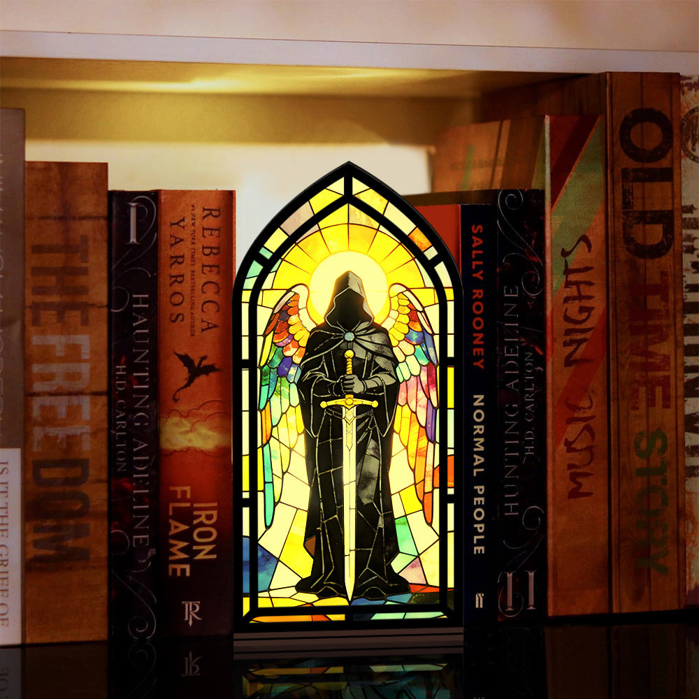 Stained-glass arched book nook display with hooded knight holding sword, on black base