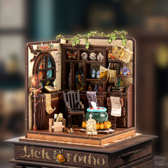 DIY miniature house kit on a wooden stand with detailed shelves, window, and tabletop items