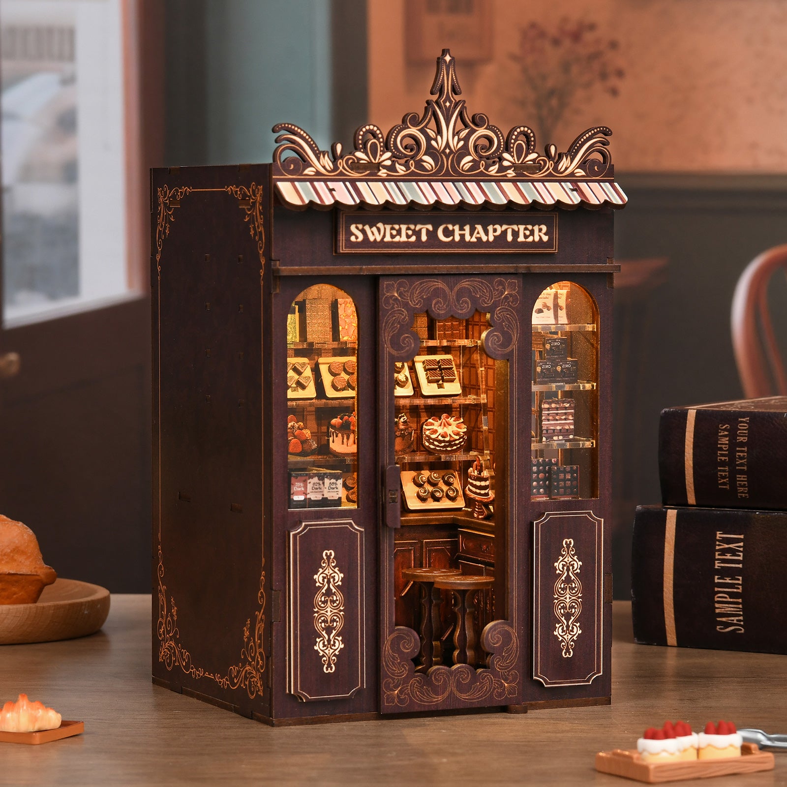 Mini shop dollhouse kit, dark brown storefront with ornate canopy and warm lit displays