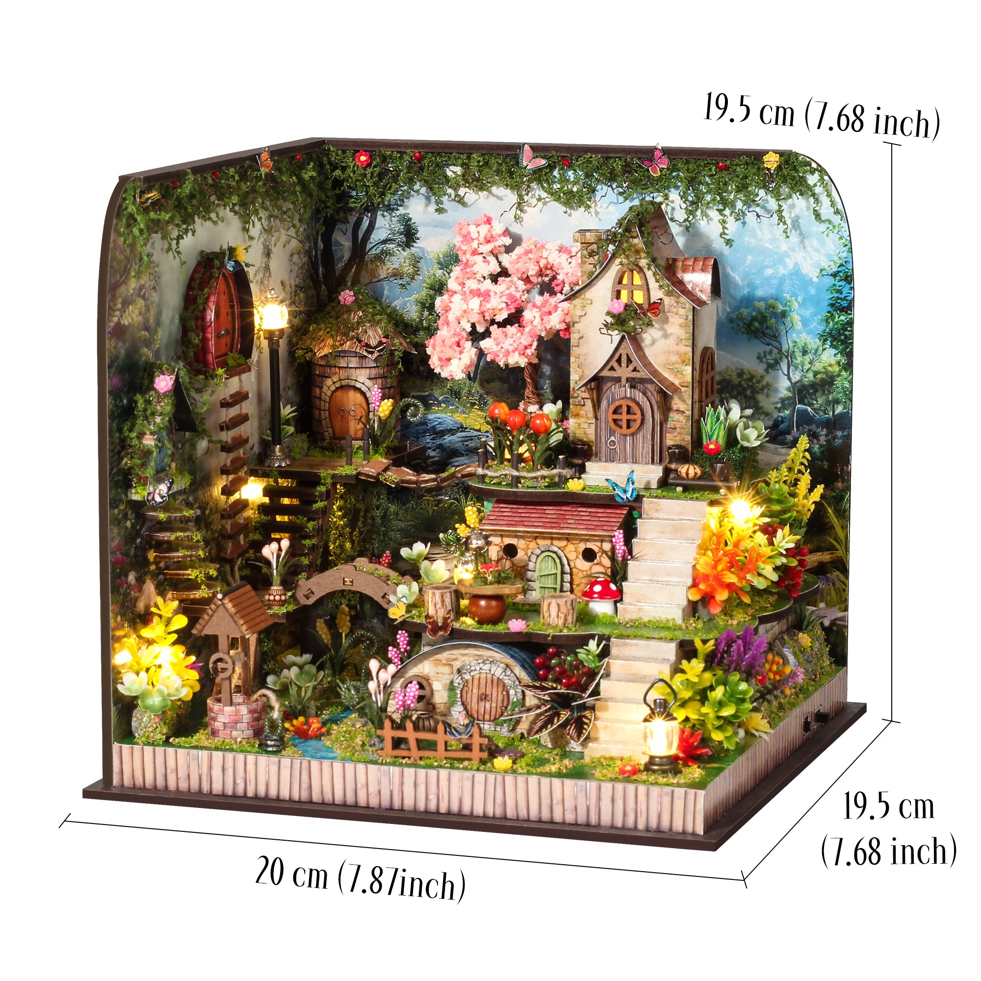 Miniature forest cabin diorama with floral trees, lanterns, and tiered garden paths