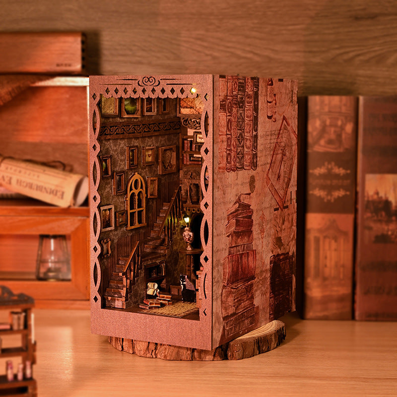 Wooden mini book nook with arched lattice doorway and warm lit interior shelves