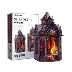 Wooden fantasy mini tower kit with lit interior, arched windows, and spire roof