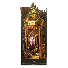 Miniature castle bookshelf display, ornate gold-lit interior with gothic arch details