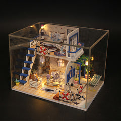 DIY miniature craft kit dollhouse with blue accents, furniture and warm lights
