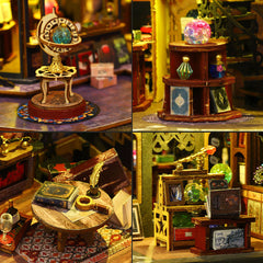 Miniature interior details: globe lamp, desk items, and small shelves with colorful ornaments