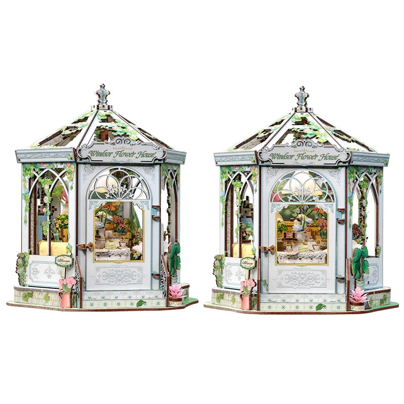 Miniature 3D wooden book nook pavilion with white frame, stained glass, and floral decor