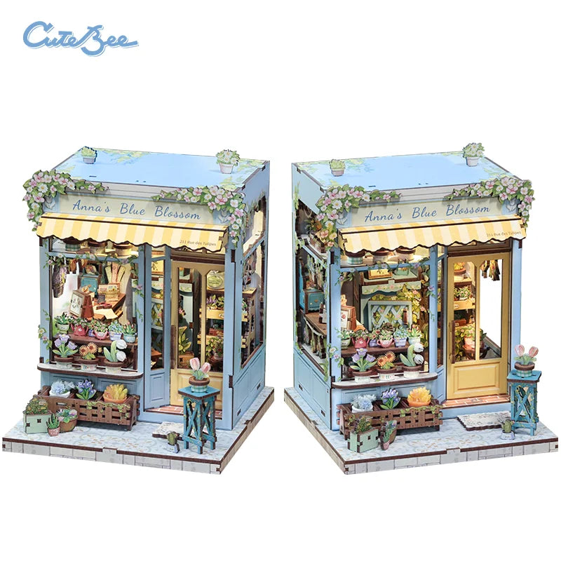 3D wooden puzzle storefront with blue panels and "Anna's Blue Blossom" awning