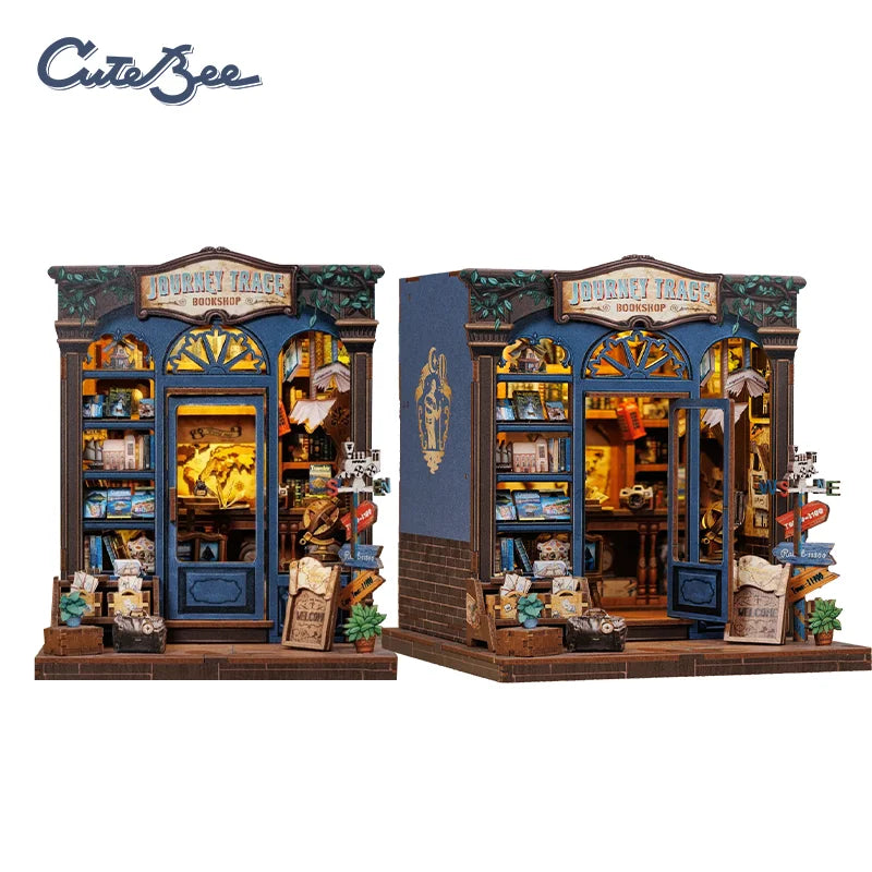Miniature 3D wooden book nook storefront with blue panels, yellow lights, and boxed sign