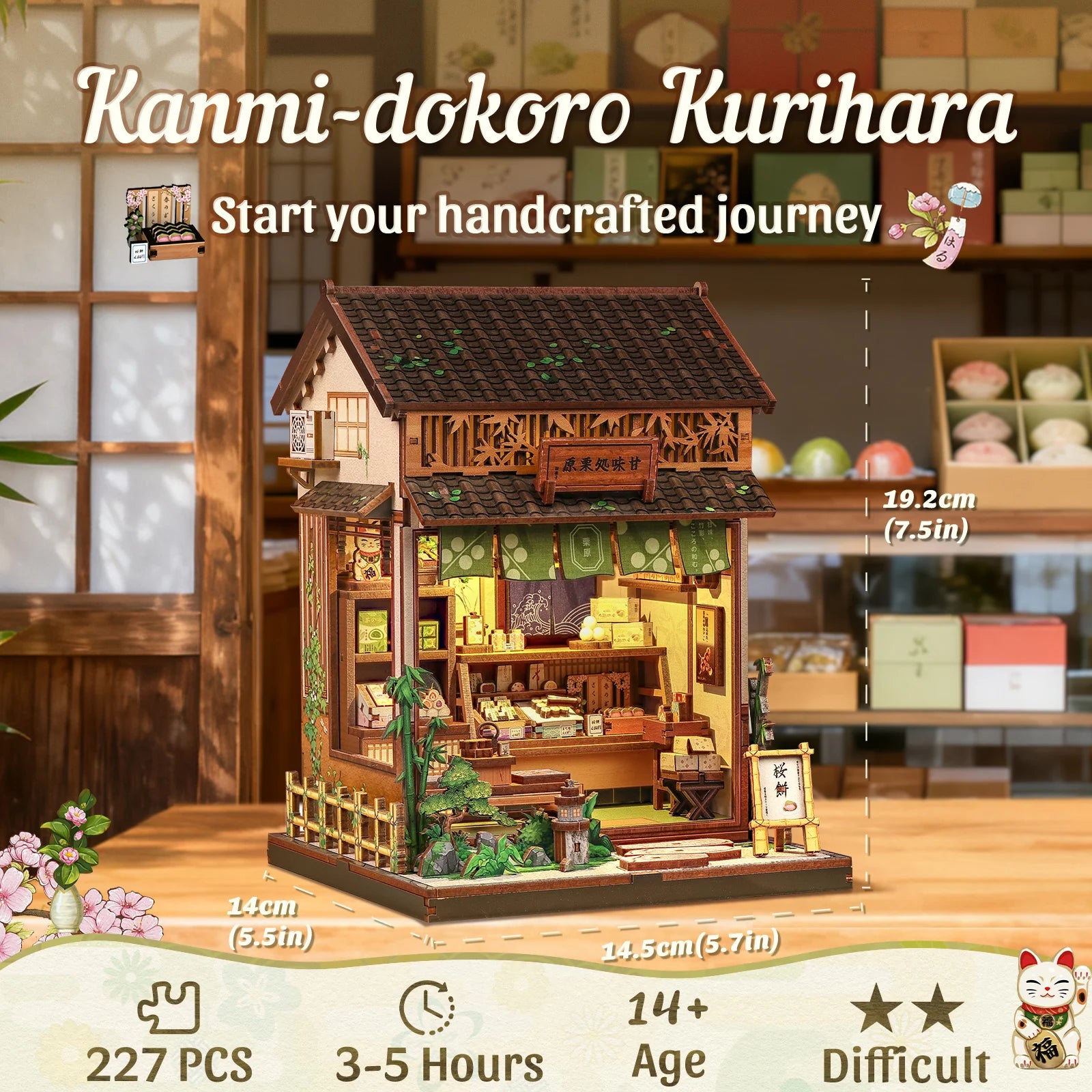 Miniature wooden shop building with green awnings, open front, and warm interior display
