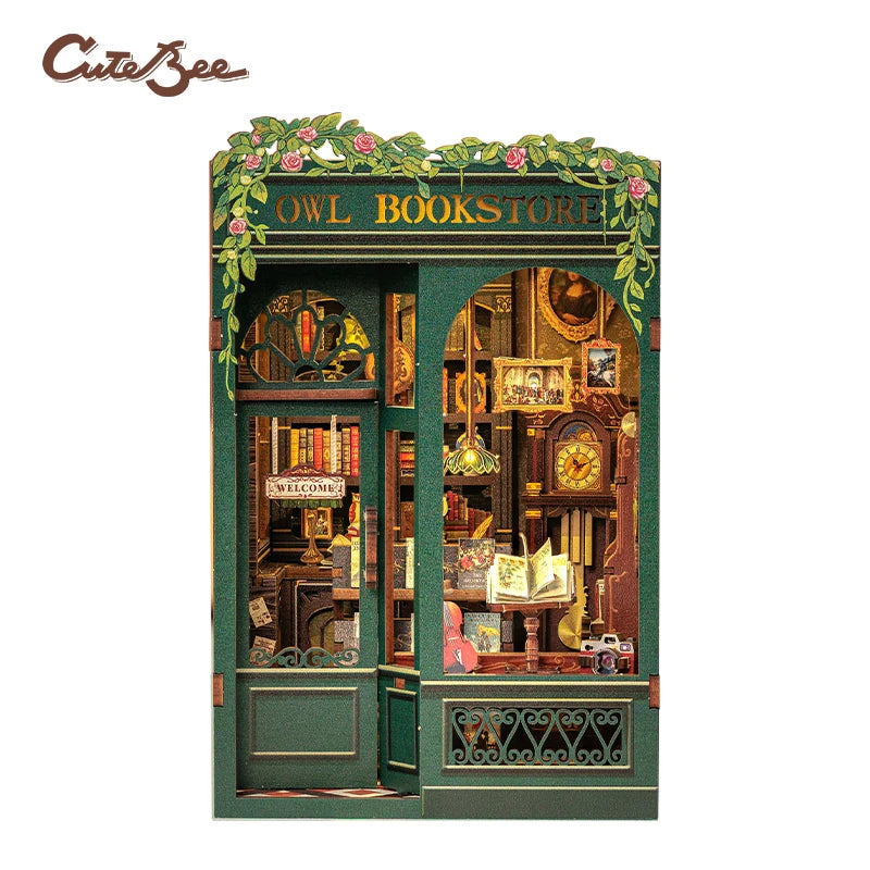 Miniature 3D wooden book nook storefront with green exterior and owl book-sign details