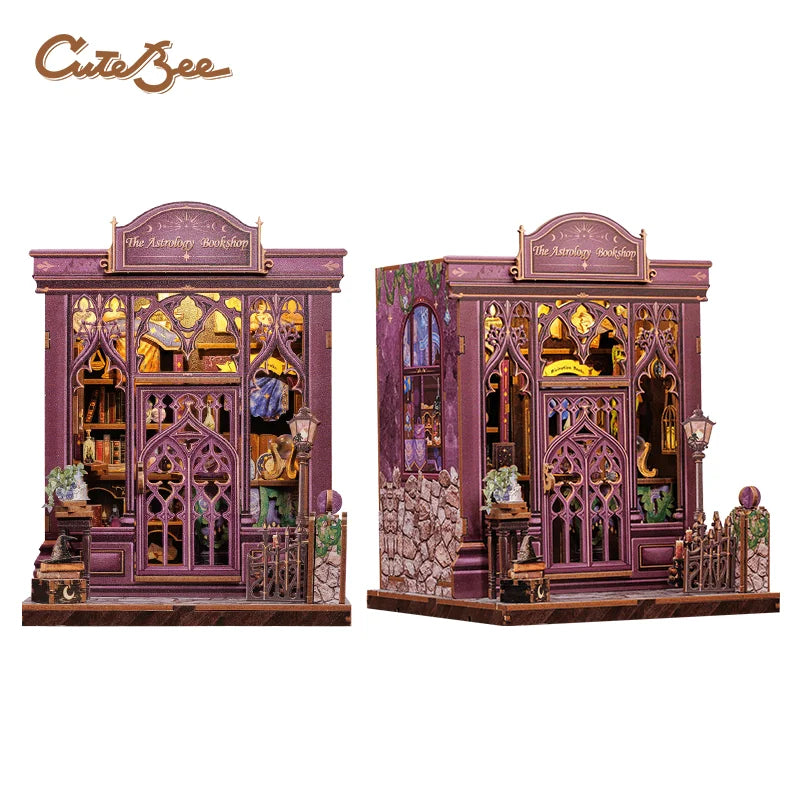 Miniature 3D wooden book nook storefront with purple facade, ornate arches, and warm interior