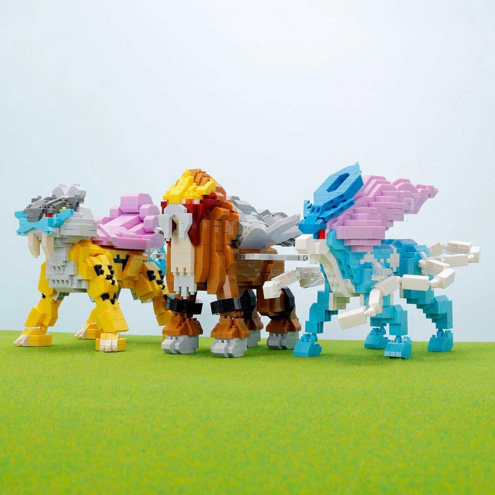 Set of three built Entei-style figures: yellow, brown, and blue with gray accents