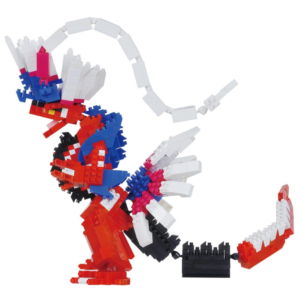 Assembled block figure in red, blue, black, and white with open claw feet