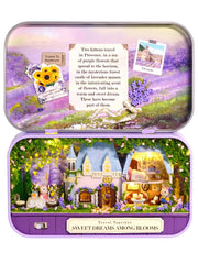 Purple travel tin box theater with miniature garden scene and front label