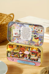 Miniature Lucky Market tiny shop tin case with open doors, miniature market scene and characters.