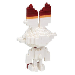 A white and red Lego bunny figurine made up of numerous small Lego bricks.