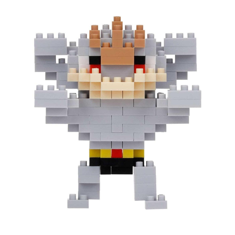 A pixelated toy figure made up of various gray and brown blocks, resembling a character or monster.
