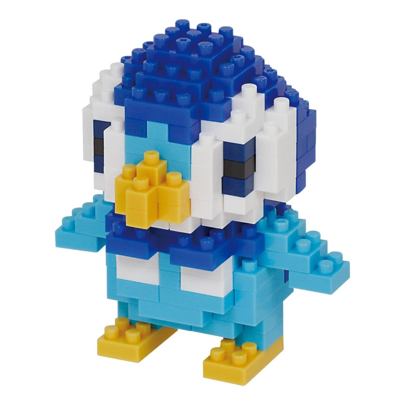 A colorful, pixelated penguin-shaped building block toy made of various blue, white, and yellow blocks.