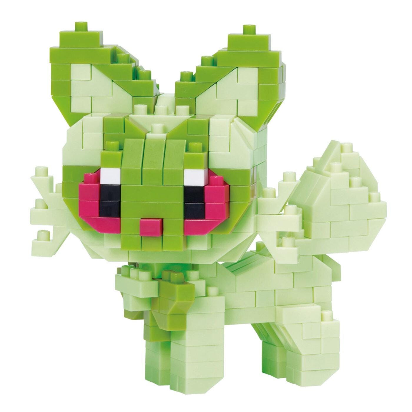 A green and pink pixelated character made up of small blocks, resembling a pixelated character or a pixel art design.