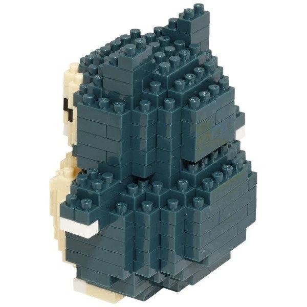 A 3D model of a Pokemon character made of small blue and green building blocks.