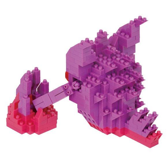 A purple and pink Lego structure resembling a stylized animal or geometric shape.