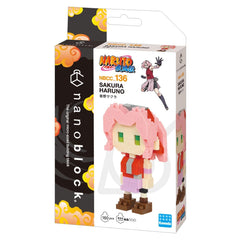 a box containing a small pink-haired figurine of a character from the animated series "Naruto".