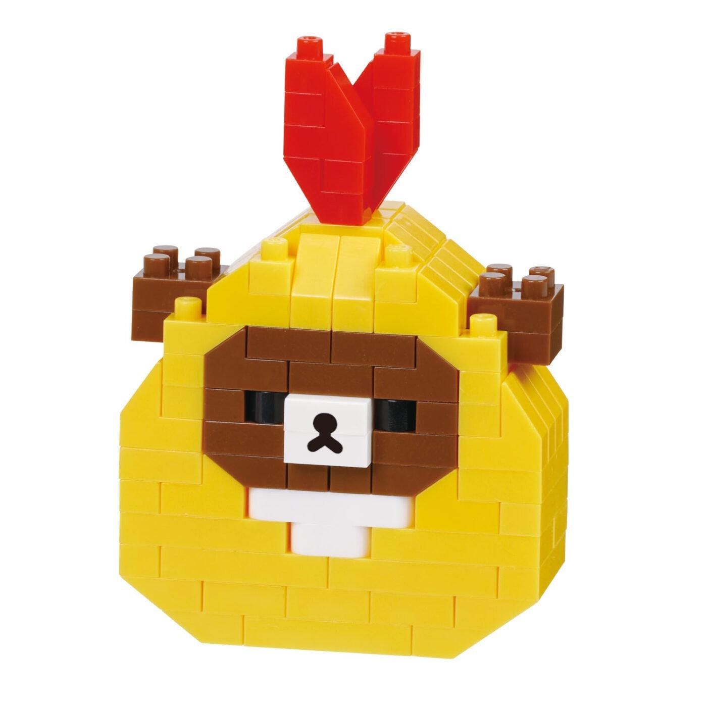 A yellow and brown block figure resembling a bear or a similar animal, with a red flower-like structure on top.