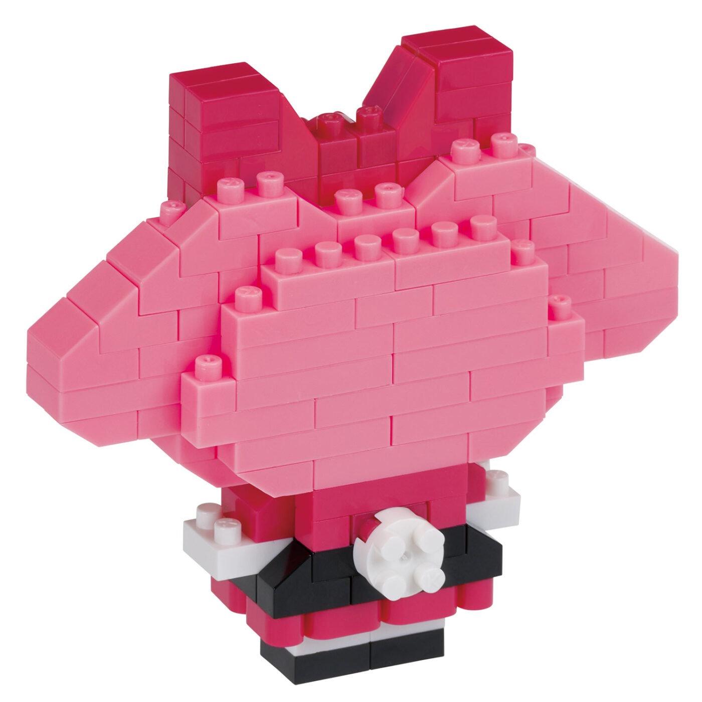 A pink and black Lego figure made up of various Lego bricks.