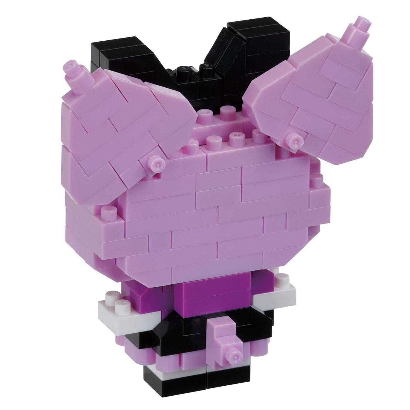 A pink and black Lego figure made up of various Lego bricks.