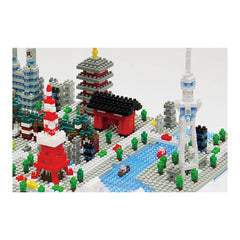 A collage of various Lego structures, including a tower, a temple, a bridge, and a cityscape, all made up of small Lego bricks.