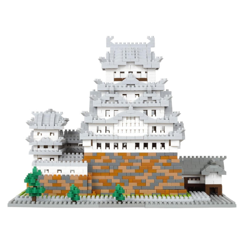 A detailed 3D model of a Japanese castle-like structure made of small, colorful building blocks.