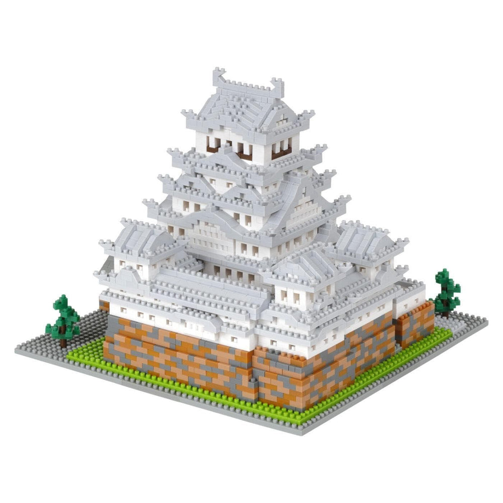 A 3D model of a Japanese castle-like structure made of small, colorful building blocks.