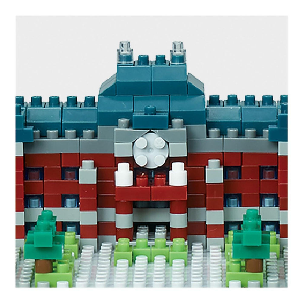 A colorful and intricate Lego structure, composed of various colored bricks, including red, blue, green, and white. The structure appears to be a detailed architectural model or a creative play piece.