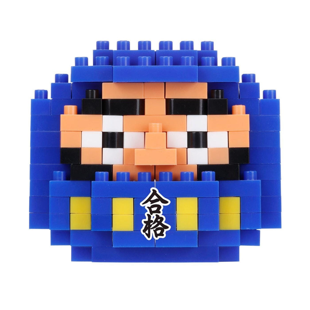 A pixelated image of a character made up of blue and yellow blocks, with a small Japanese character on the bottom right.