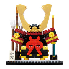 A colorful and intricate Lego figure resembling a warrior or knight, with yellow and red accents, black and red accents, and a red and black shield.