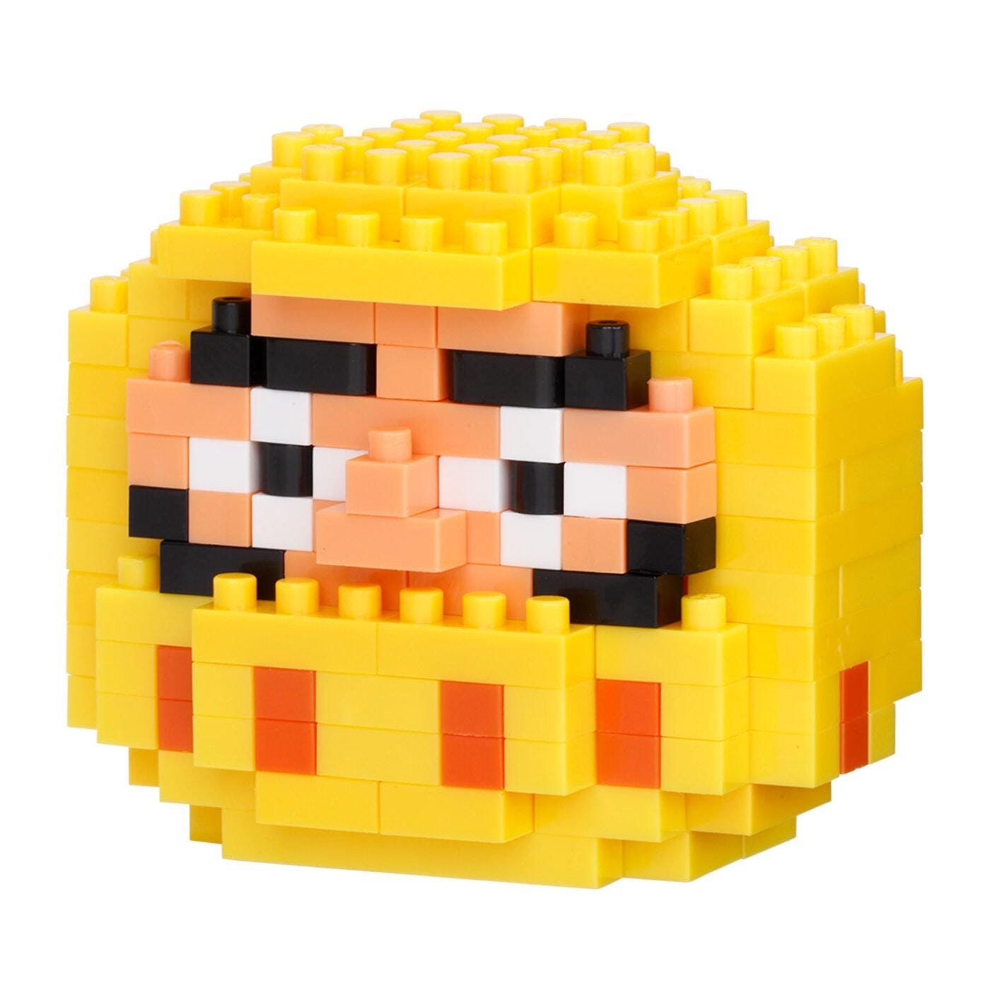 A yellow, pixelated face made up of numerous small yellow and orange blocks, creating a playful and colorful appearance.