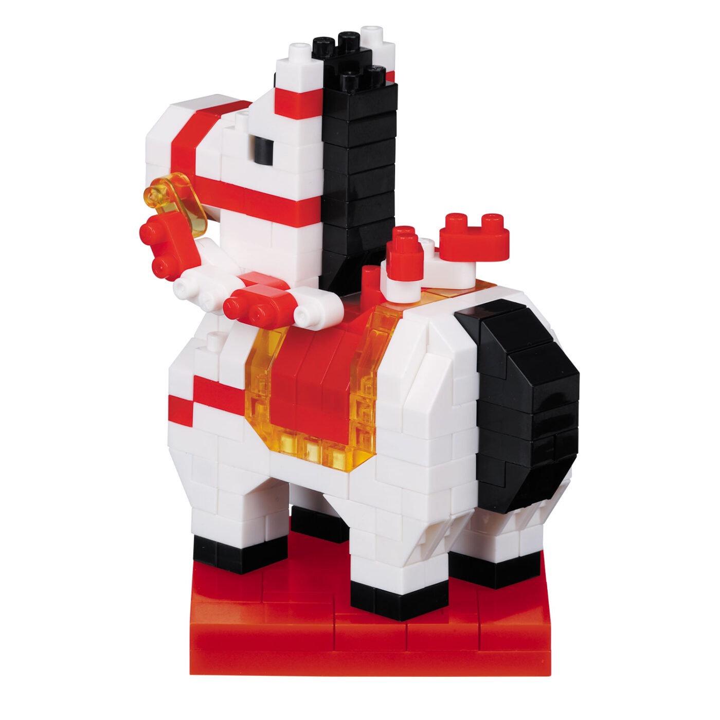 A toy horse made of colorful building blocks, with a red and white color scheme.